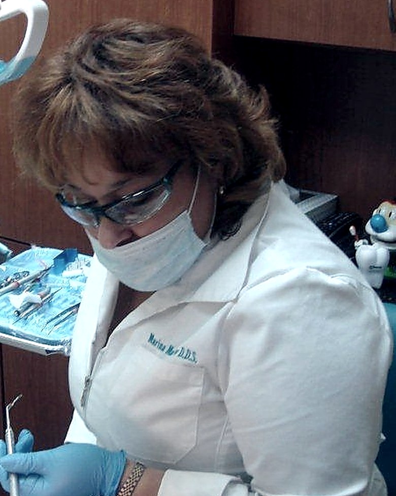 Dr. Marina Manosov treating a patient